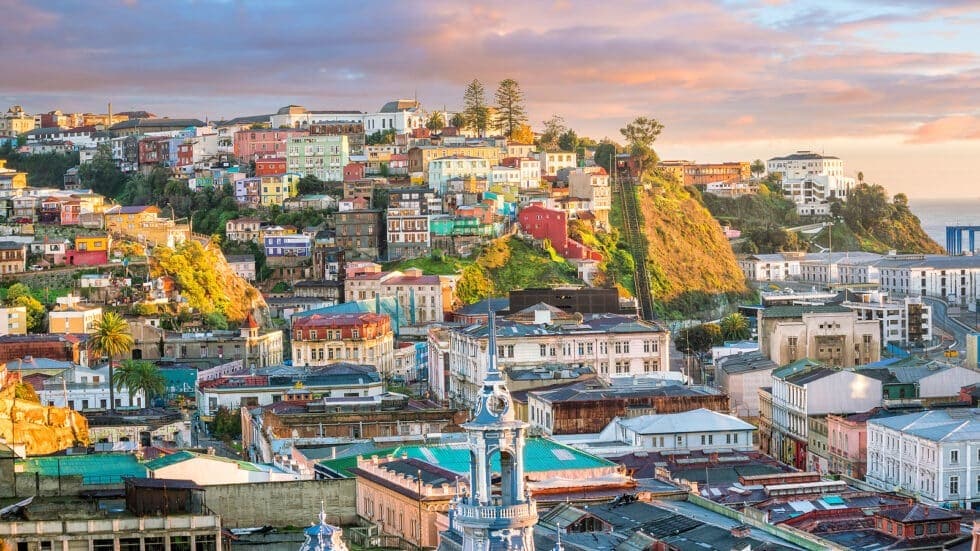 Tripps Now Reviews showcases the colorful hills and dense urban landscape that give Valparaiso its distinctive visual identity.